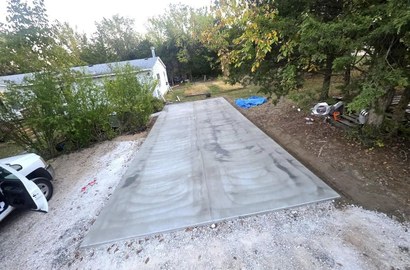 broom-finished concrete patio in a Colorado Springs backyard