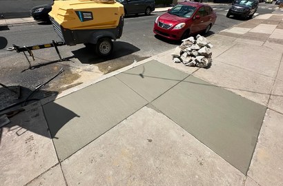 new sidewalk construction Colorado Springs crew